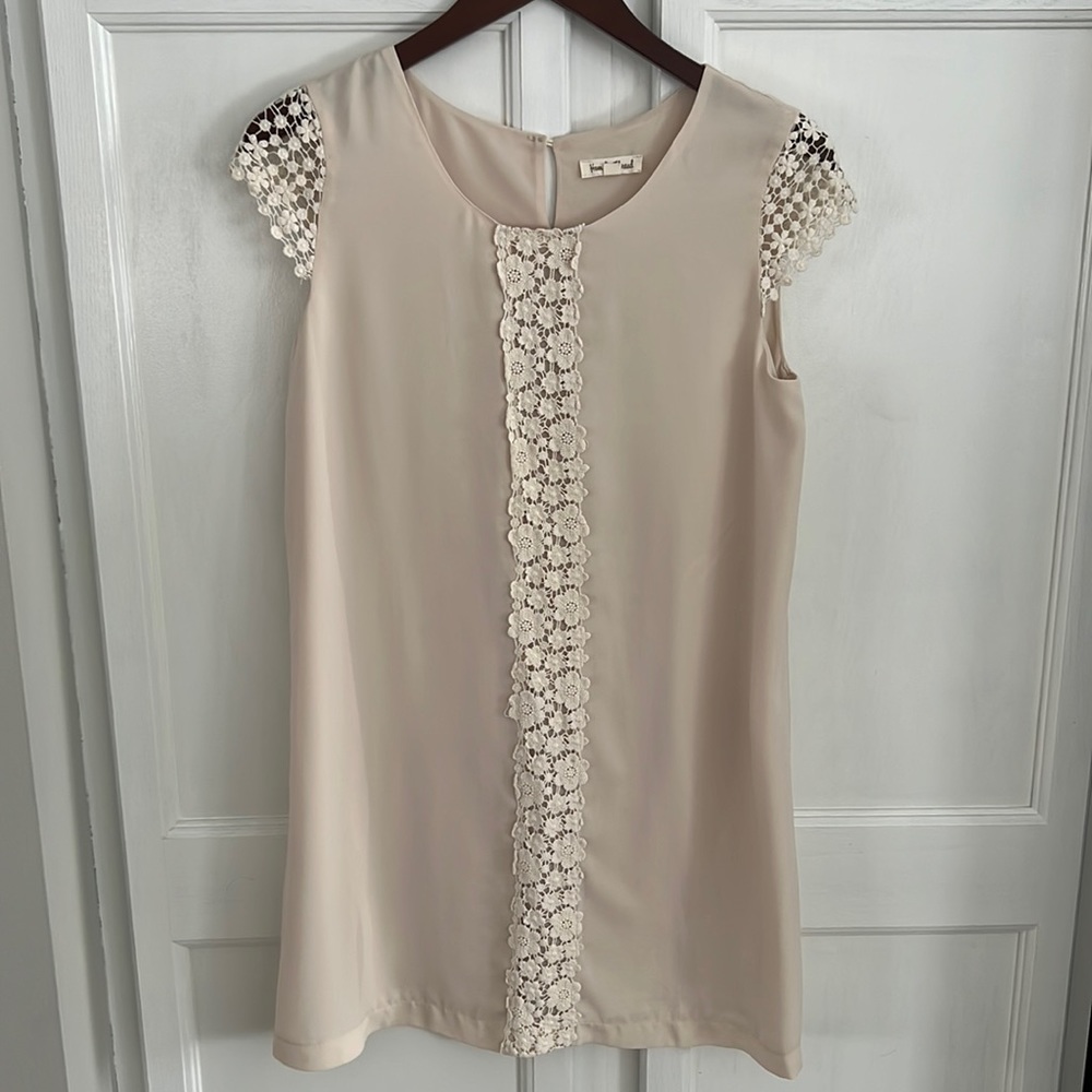 Hem and Thread Ivory Dress